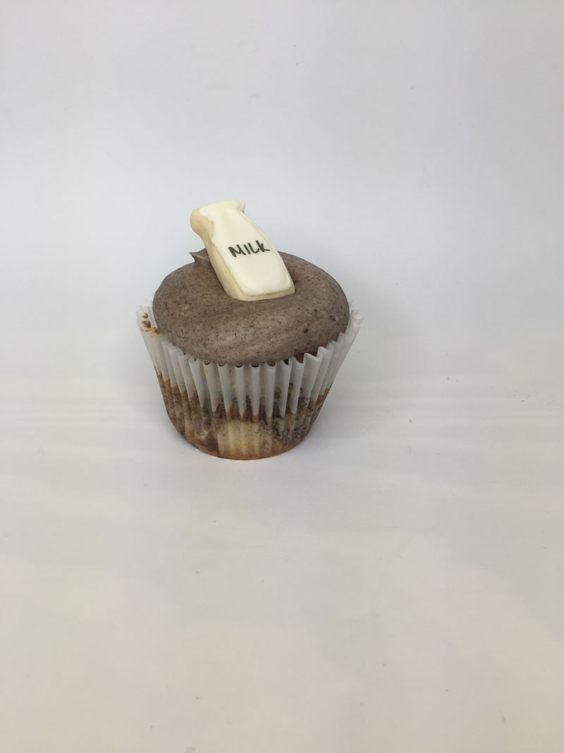 Cookies and cream milk topper cupcake