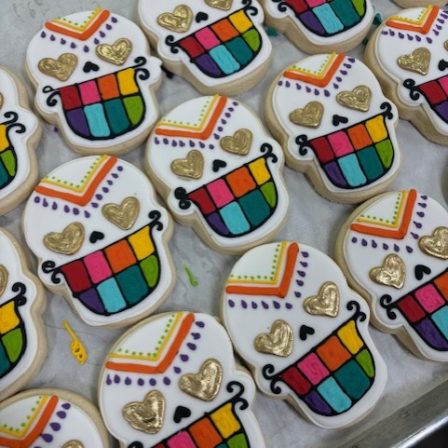 Rainbow teeth sugar skull cookie