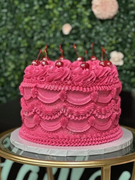 cherry topped vintage cake